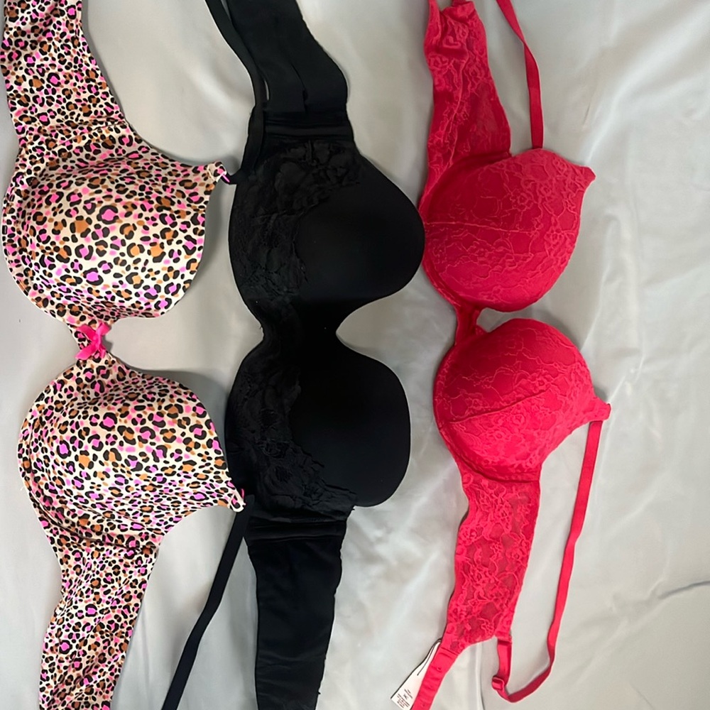 3- 34C VS Bra. Red, multi color bra with straps & 1 strapless black bra